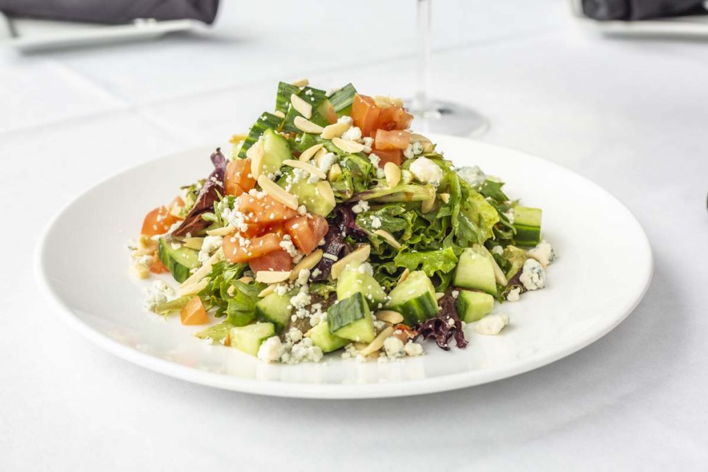 Tucci’s salad with chopped greens and tomatoes